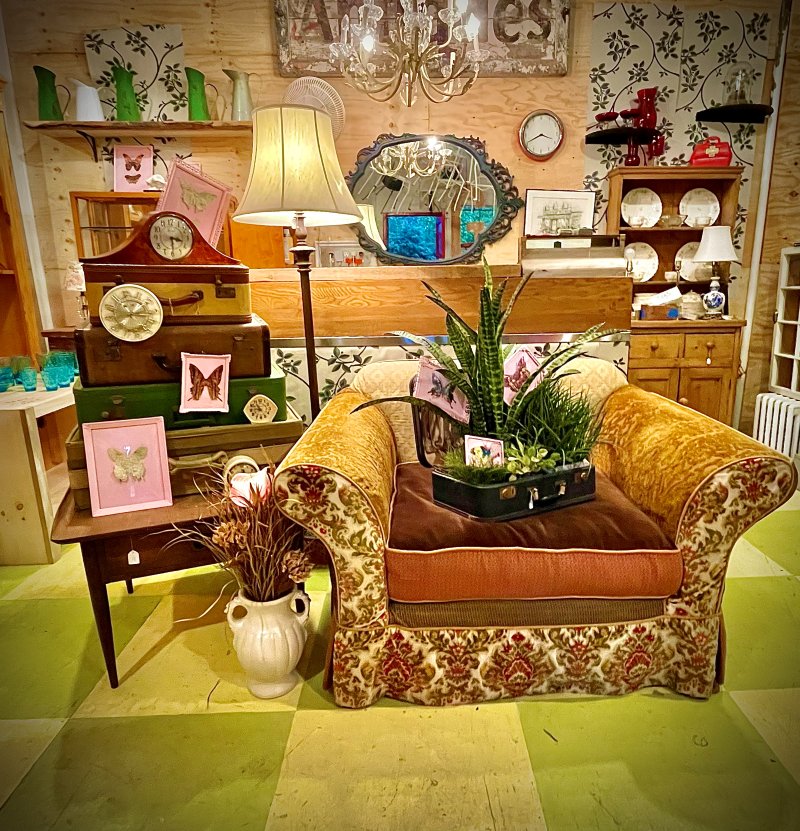 Styled antique shop room with checkerboard floor