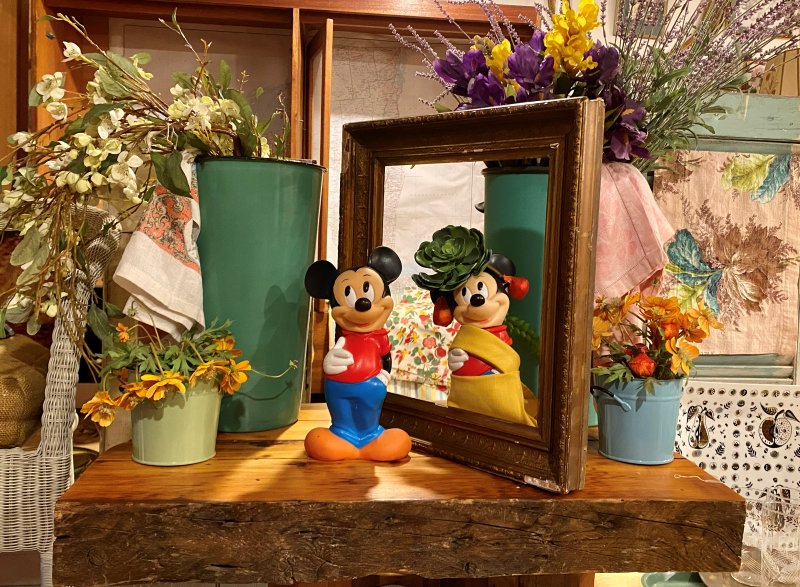 Vintage figurine and mirror display